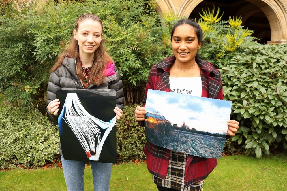 Shona (pictured right) and Srinidhi (pictured left) with their winning entries for the Photography competition.